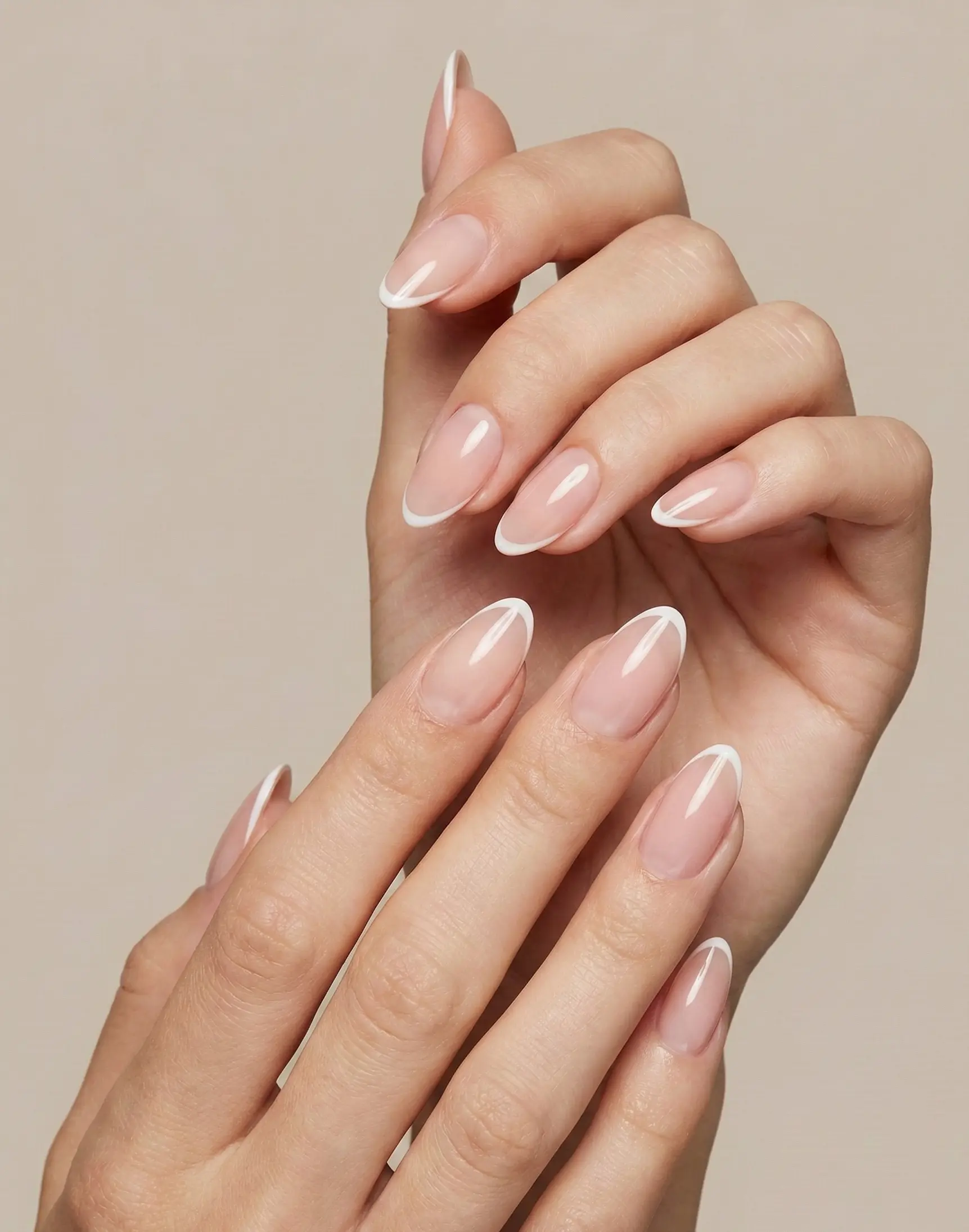Sleek Micro White French Tips On Almond Nails For Modern Minimalists