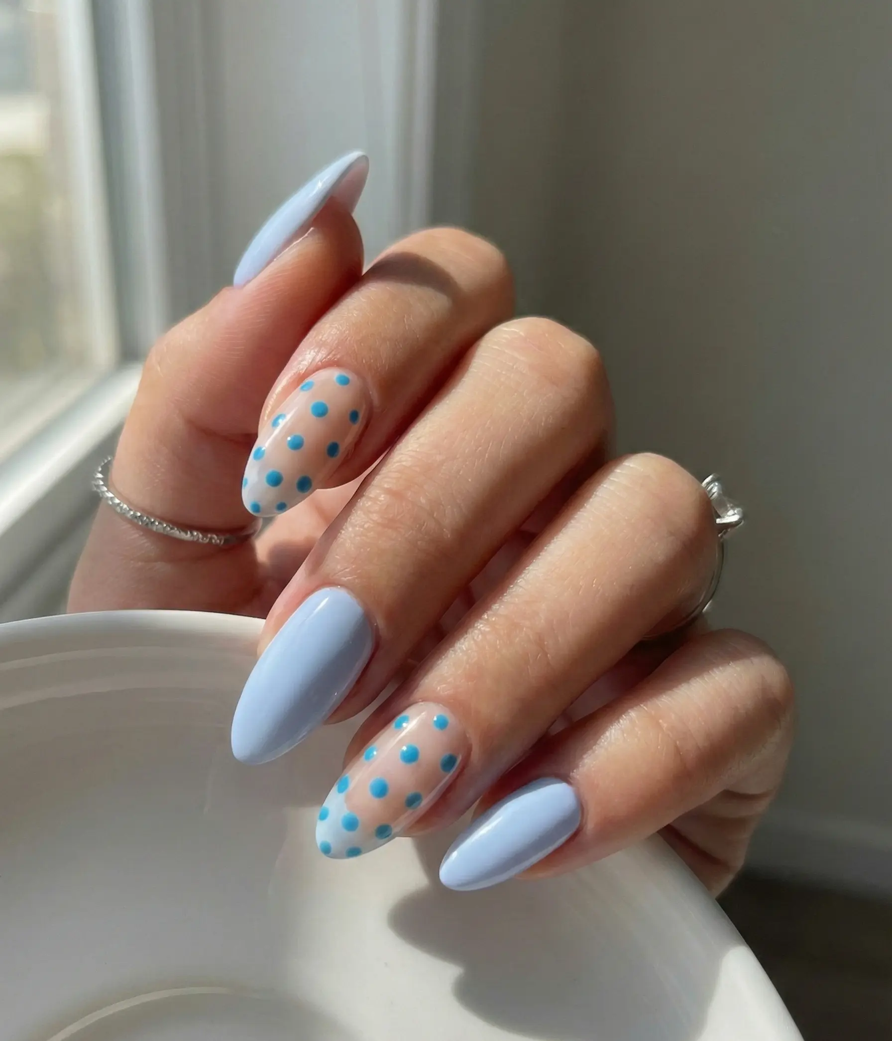 Playful Baby Blue Polka Dot Almond Nails For Spring And Summer