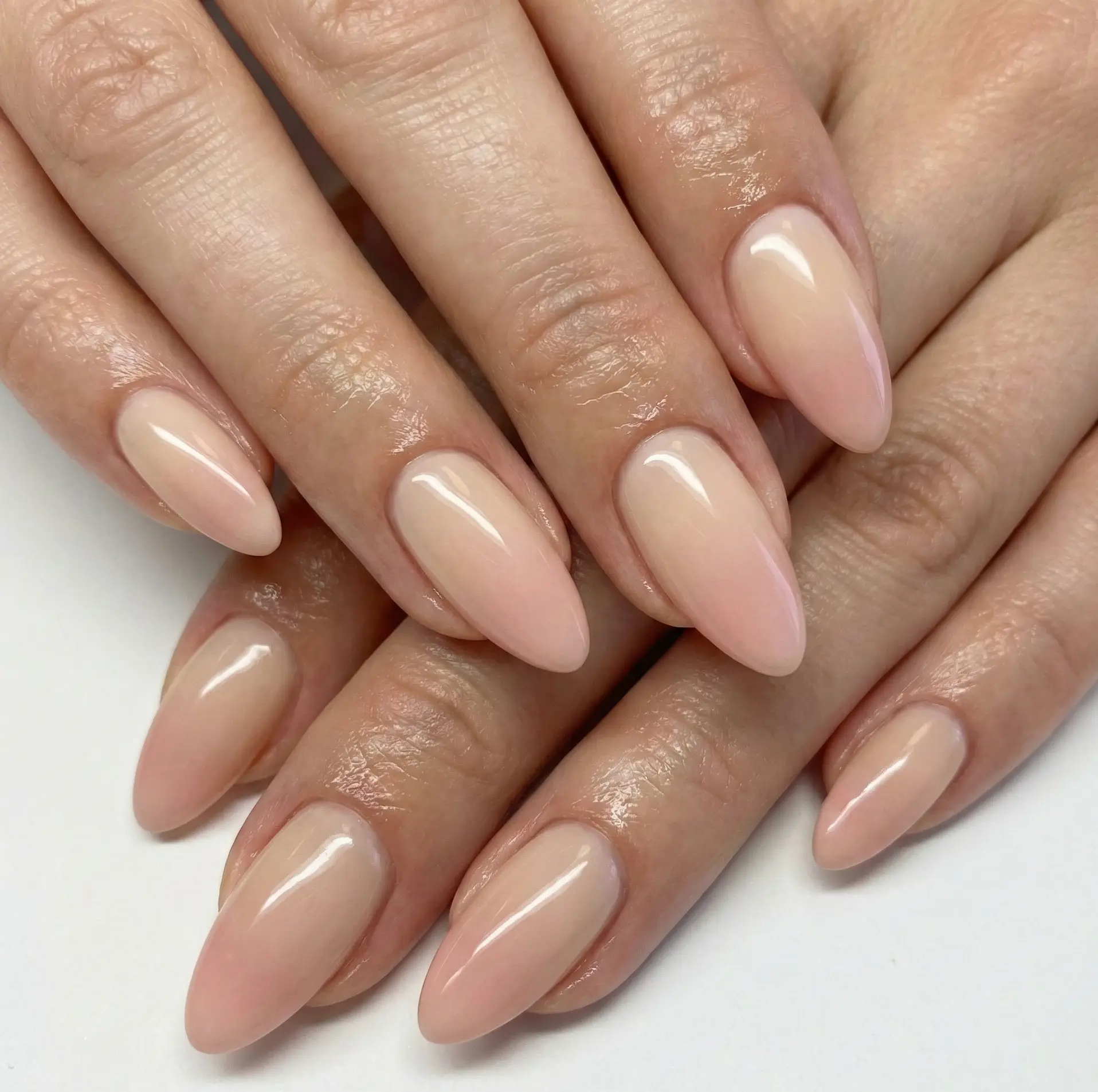 Seamless Soft Pink And Nude Ombre Fade On Medium Almond Nails